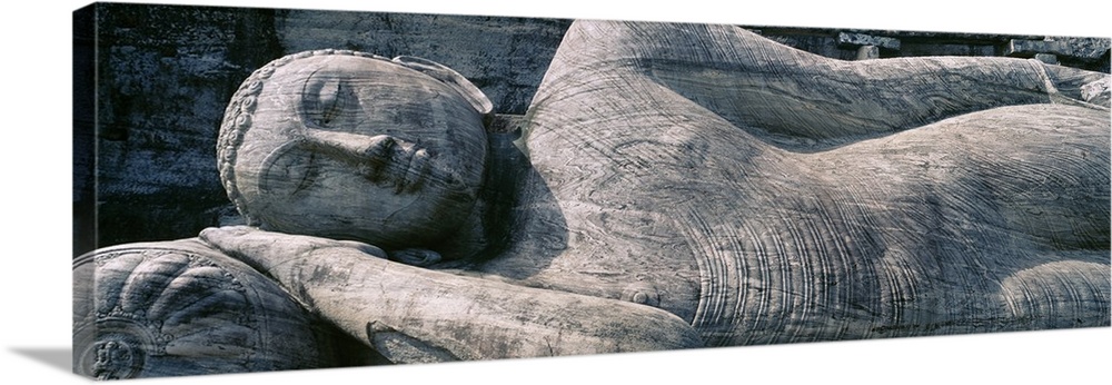 Panoramic photograph taken of a huge sleeping Buddha statue.