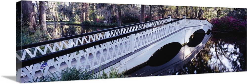 Reflection of a bridge in water, Magnolia Plantation and Gardens, Charleston, South Carolina