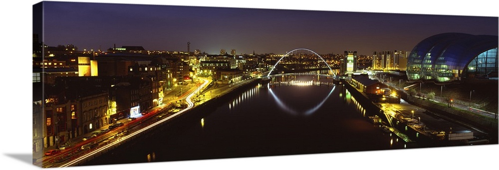 Reflection of a bridge on water, Millennium Bridge, Newcastle, Northumberland, England