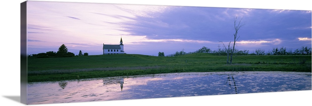 Reflection of a church near a pond, North Dakota