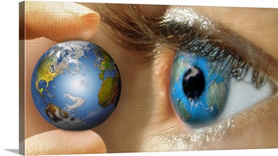 Reflection of a globe in a person's eye