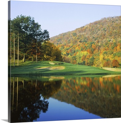 Reflection of a hill on water, West Point Golf Course, West Point, New York State