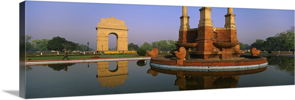 Reflection of a monument in water, India Gate, New Delhi, India