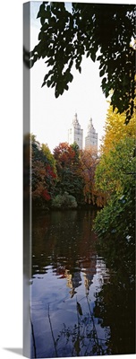 Reflection of buildings in water, Central Park, Manhattan, New York City, New York