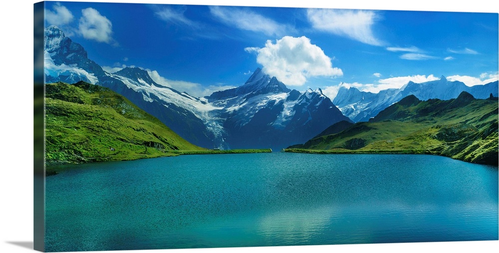 Reflection of clouds and mountain in a lake, bachalpsee, grindelwald, bernese oberland, switzerland.