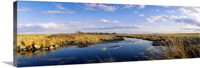 Reflection of clouds in a lake, Prairie Pothole Region, North Dakota