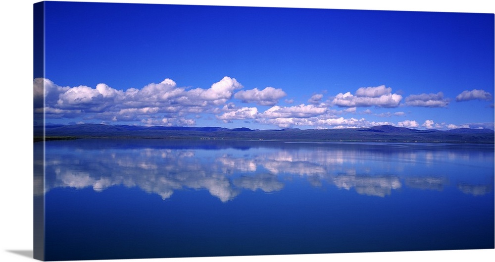 Reflection of clouds in water, Olfusa, Iceland