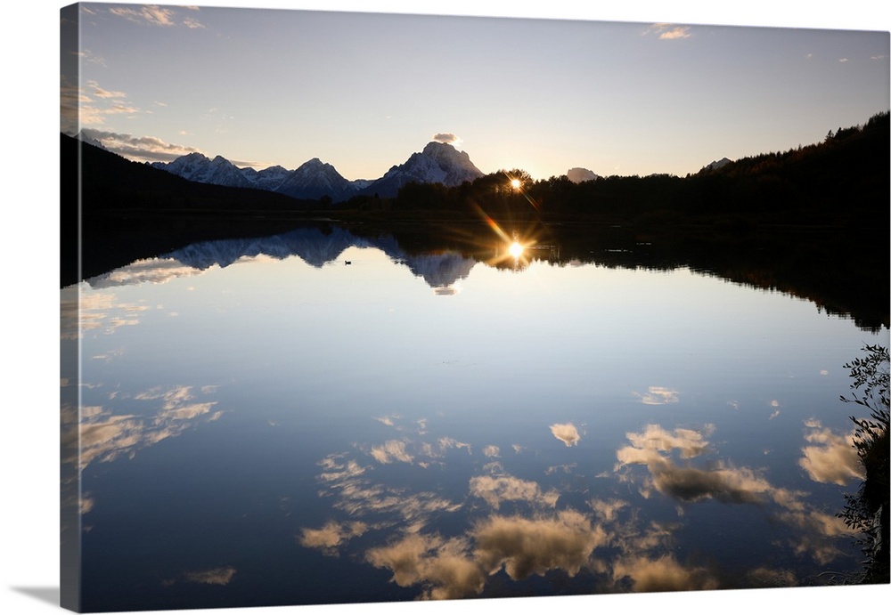 Reflection of clouds on water, Teton Range, Grand Teton National Park, Wyoming, USA