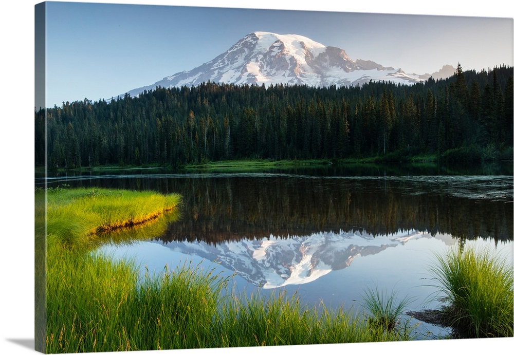 Reflection of mountain in lake, Mount Rainier National Park, Washington State, USA