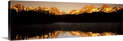 Reflection of mountains and trees in water Little Redfish Lake Sawtooth National Recreation Area Custer County Idaho
