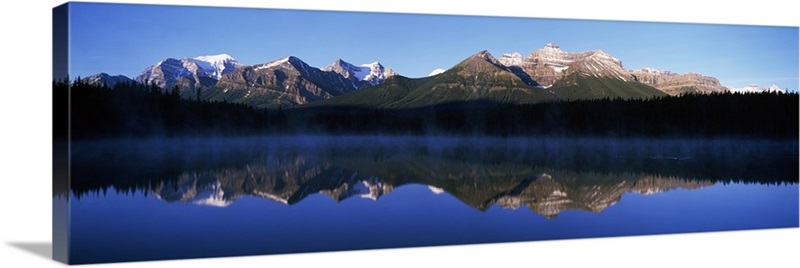 Reflection of mountains in a lake, Lake Herbert, Banff National Park ...