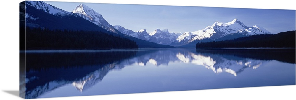 Reflection of mountains in a lake, Maligne Lake, Jasper National Park, Alberta, Canada