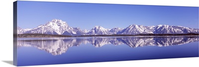 Reflection of mountains in a lake, Teton Range, Jackson Lake, Grand Teton National Park, Wyoming,