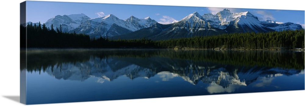 Reflection of mountains on water, Herbert Lake, Banff National Park, Alberta, Canada