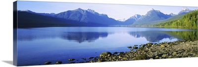Reflection of rocks in a lake, McDonald Lake, Glacier National Park, Montana