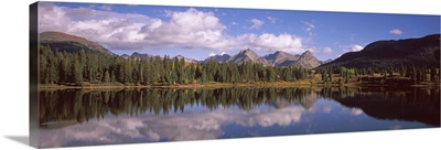 Reflection of trees and clouds in the lake, Molas Lake, Colorado