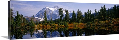 Reflection of trees and mountains in a lake, Mount Shuksan, North Cascades National Park, Washington State, USA
