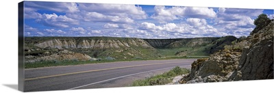 Road passing through a landscape, Badlands, Theodore Roosevelt National Park, North Dakota