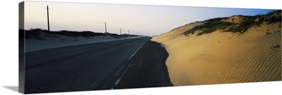 Road passing through a landscape, South Padre Island, Texas