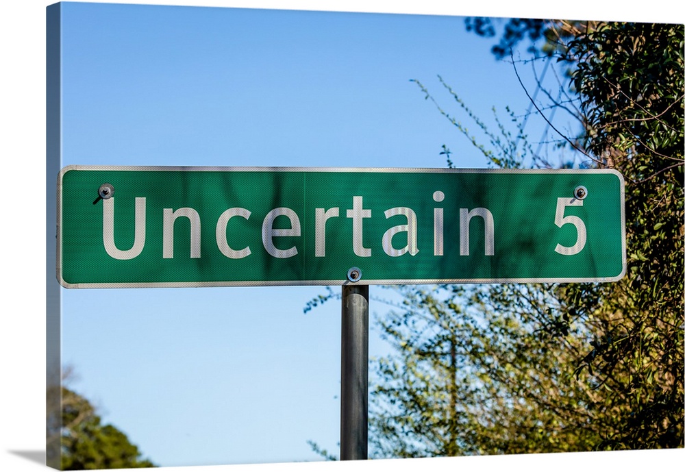 Road sign to uncertain, texas.