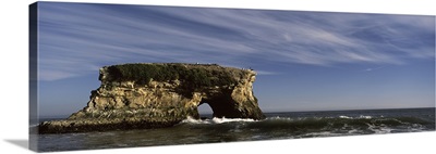 Rock formations in ocean, Natural Bridges State Beach, Santa Cruz