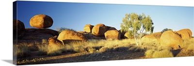 Rock formations on a landscape, Devils Marbles, Northern Territory, Australia