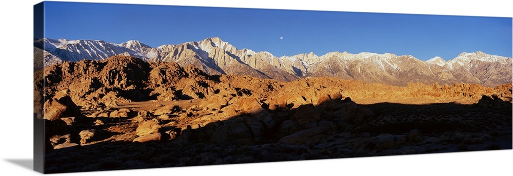 Rock formations on a mountain range, Moonset over Mt Whitney, Lone Pine, California