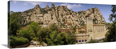 Rock formations over a monastery, Montserrat Monastery, Montserrat Barcelona, Catalonia, Spain