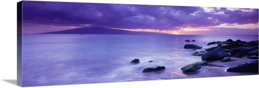 Rocks on coast at sunset, Maui, Hawaii