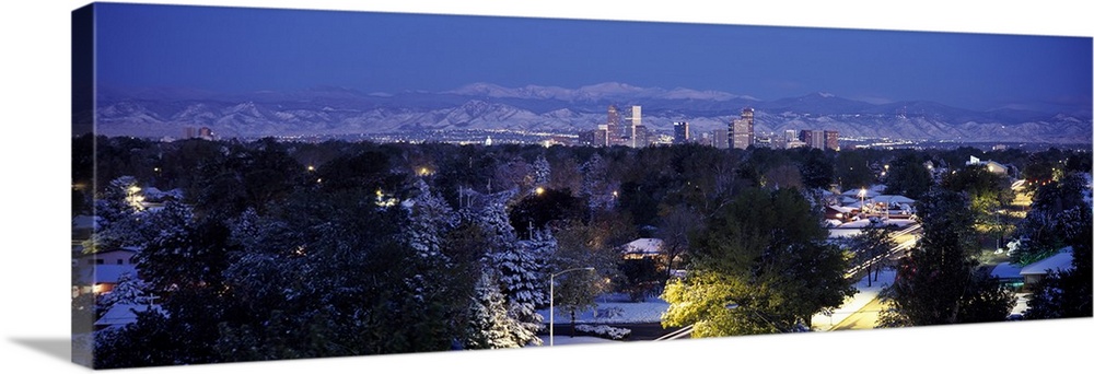 Panoramic photo on canvas of the cityscape of Denver with snowy mountains in the distance.