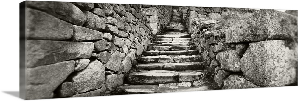 Ruins of a staircase at an archaeological site Inca Ruins Machu Picchu Cusco Region Peru
