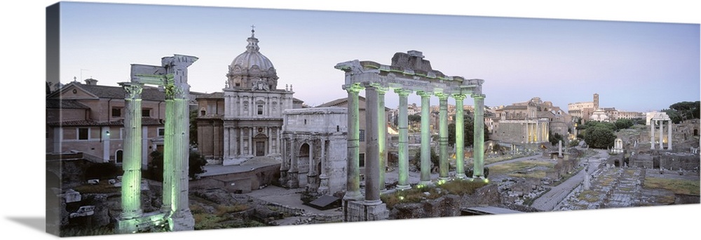 Columns and ruins in Italy are pictured in panoramic view.