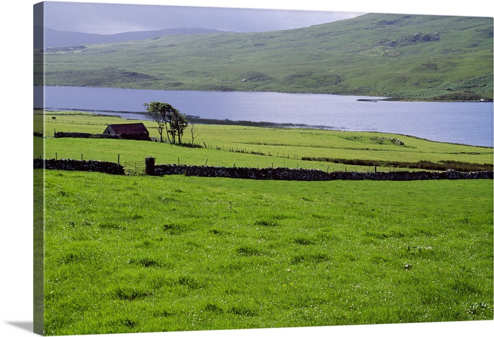 Rural countryside with lake, Ireland.