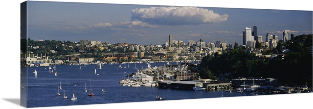 Sailboats in a lake with a city in the background, Lake Union, Seattle, Washington State
