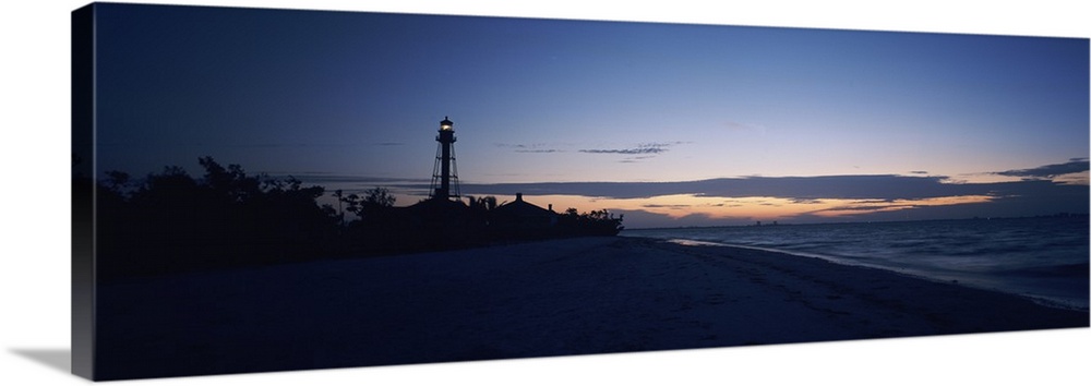 Wide angle photograph on a large canvas of the shoreline at Sanibel Island, in the darkness of early dawn, the Sanibel Isl...