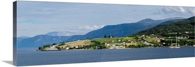 Scenic view of village at seaside, Vangsnes, Vik, Sogn og Fjordane County, Norway