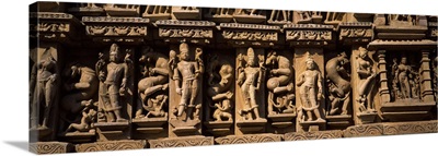 Sculptures on the wall of a temple, Khajuraho Temple, Khajuraho, Chhatarpur District, Madhya Pradesh, India