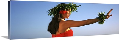Side profile of a Hula dancer dancing, Hawaii