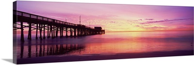 Silhouette of a pier at sunset, Newport Pier, Newport Beach, California