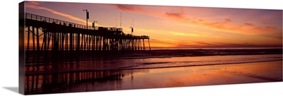 Silhouette of a pier in an ocean, Pismo Beach, San Luis Obispo County, California,
