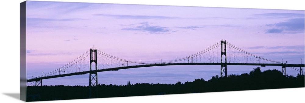 Silhouette of a suspension bridge across a river, Thousand Islands Bridge, St. Lawrence River, New York State
