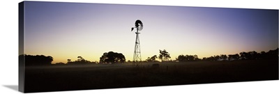 Silhouette of a windmill in a field, Cowaramup, Shire of Augusta-Margaret River, Western Australia, Australia