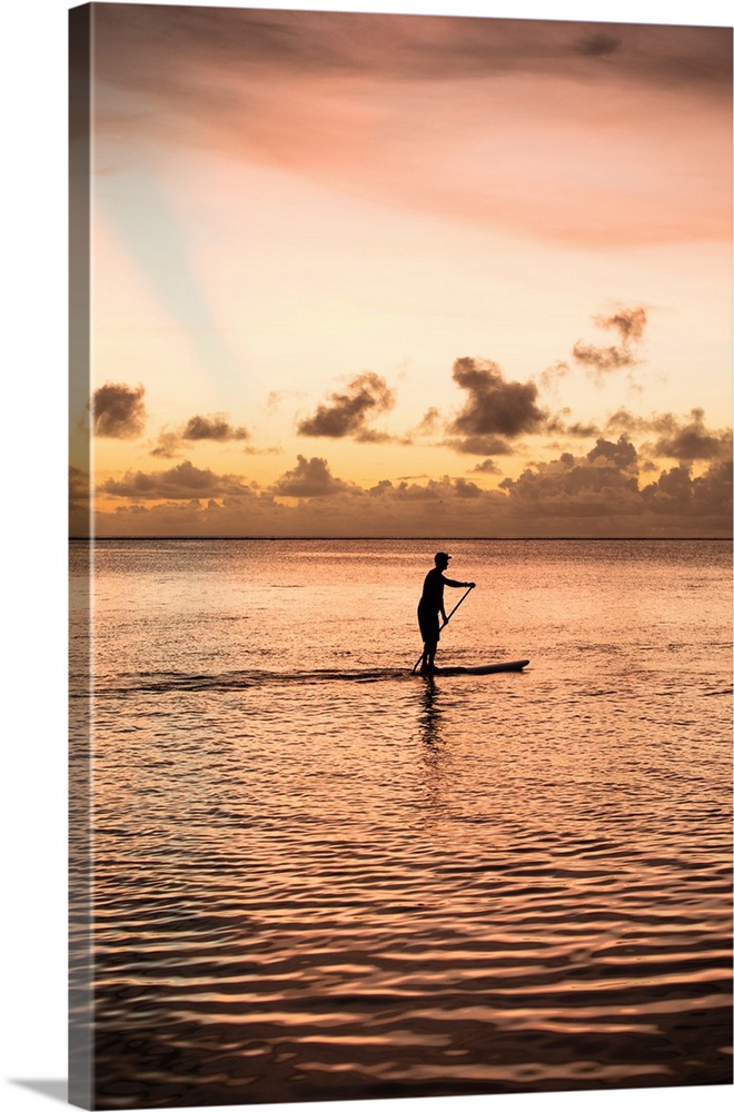 Silhouette of man paddleboarding in the Pacific Ocean, Bora Bora, Society Islands, French Polynesia