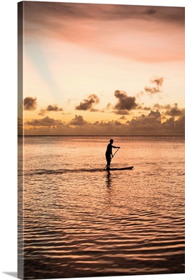 Silhouette of man paddleboarding in the Pacific Ocean, Bora Bora, French Polynesia