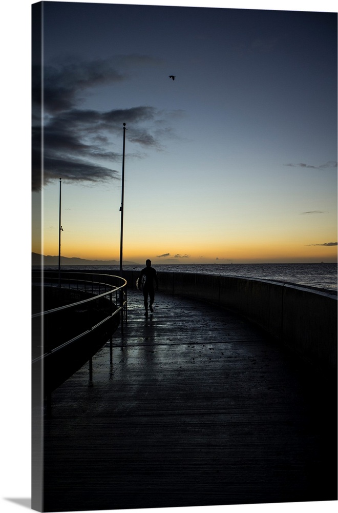 Silhouette of person walking on pier, Sandspit, Santa Barbara, Santa Barbara County, California, USA