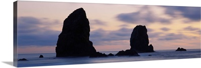 Silhouette of rocks at sunset, Cannon Beach, Oregon