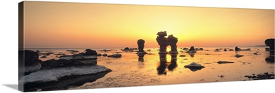 Silhouette of rocks on the beach, Faro, Gotland, Sweden