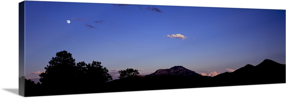 Silhouette of trees and mountains at dusk, Horseshoe Park, Rocky Mountain National Park, Colorado, USA