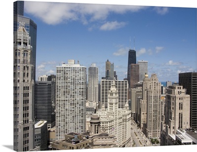 Skyscrapers in a city, Wrigley Building, Magnificent Mile, Upper Michigan Avenue, Michigan Avenue, Chicago, Illinois,