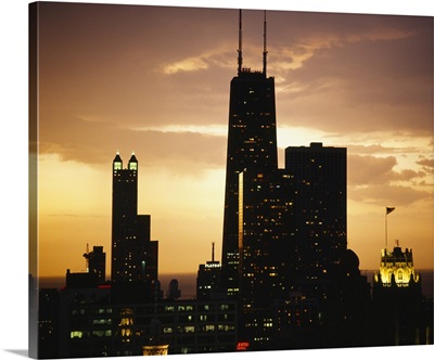 Skyscrapers lit up at sunrise, Chicago, Illinois